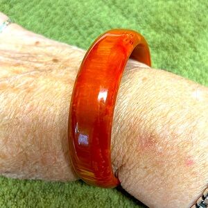 Bakelite orange/ rust colored bangle bracelet